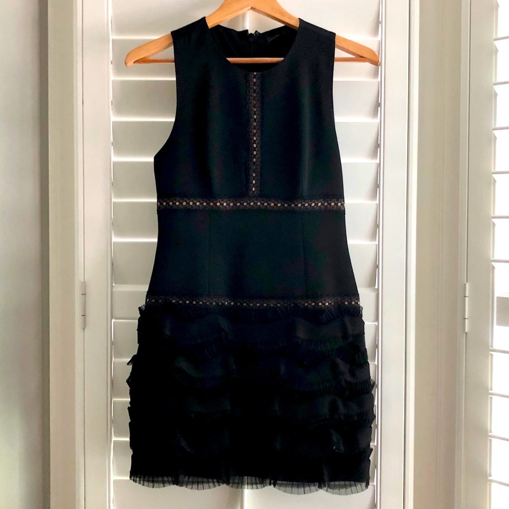 Fun and flirty little black dress! Size 2